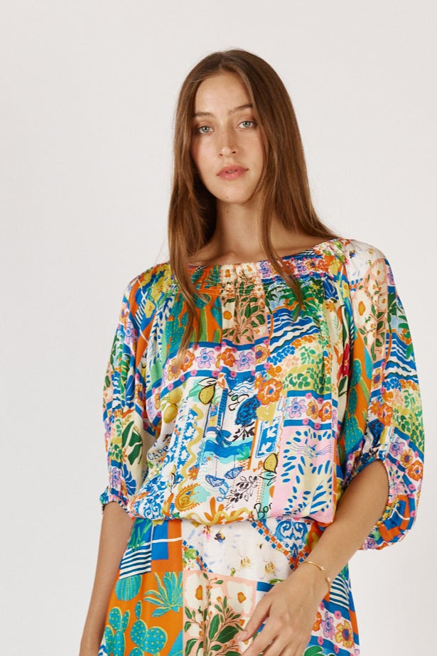 Rubyyaya Geranium Shirt Positano Greek isle inspired print Cobalt Blue lemon silk Satin model off shoulder